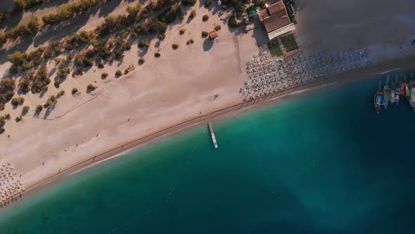 Blue Lagoon and Belcekiz Beach at the Foot of Babadag Mountain in Oludeniz Village Turkey alt