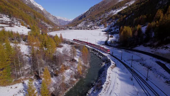 Snow Train in Switzerland Used to Shuttle Passengers and Skiers to Ski Resorts alt