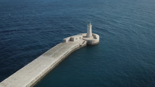 Aerial View Of Harbour Pier Lighthouse In Malta