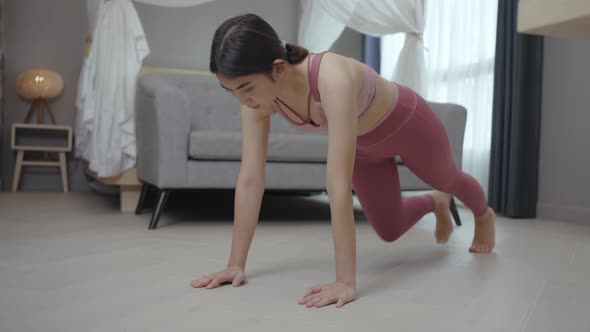 Young healthy woman workout at home, exercise, fit, doing yoga, home fitness concept.