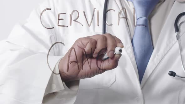 Asian Doctor Writing Cervical Cancer