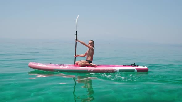 Kid on Paddle Board alt