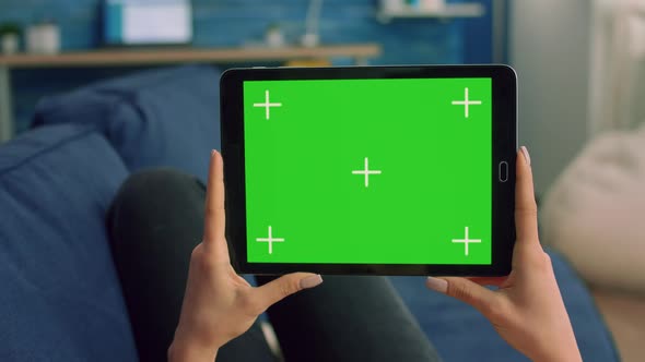 Close Up of Woman Hands Holding Isolated Tablet Computer alt