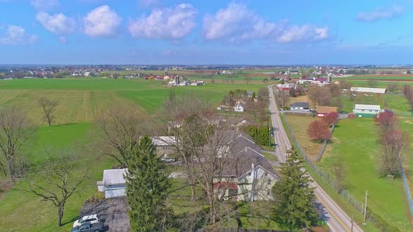 Aerial View of Rural America of Amish Farmlands With Amish Crops on a Sunny Spring Day alt