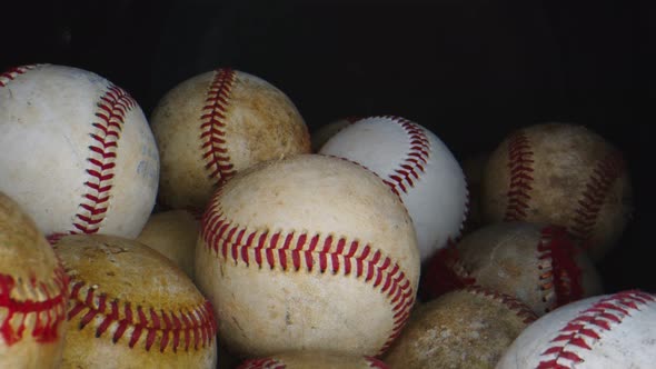 Macro Shot of Group of Baseball Balls with Black Background alt