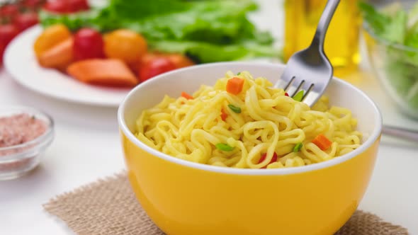 Instant Noodles with Fork Served with Vegetables and Herbs ProRes Uncompressed alt