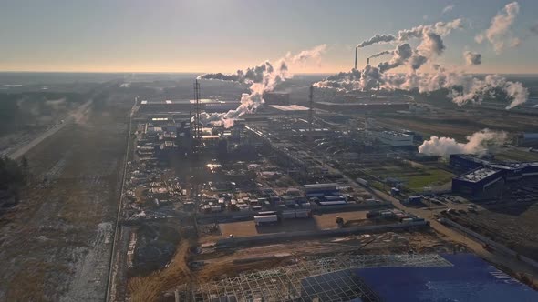 Aerial photography from drone of pipes of factories and factories alt