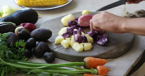 woman cut colors  potatoes alt