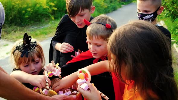 Children are Celebrating Halloween in Costumes alt