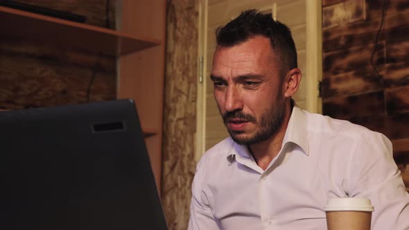 A Grieved Businessman is Counting Money He is Grieved Unforeseen Expenses alt