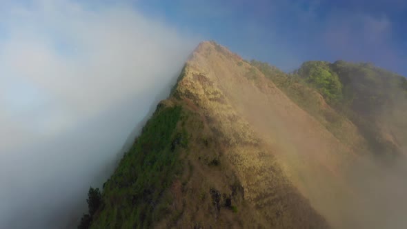 Na Pali Coast State Park. Dramatic View of the Huge Mountain, One Side of Which Is Lit with the Sun alt