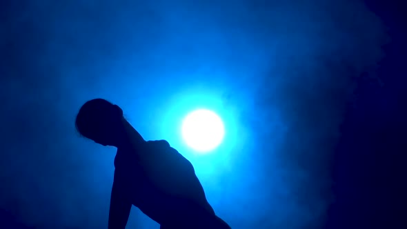 Diligent Young Graceful Ballerina Dancing Elements of Classical Ballet. Shot in the Dark with Light alt