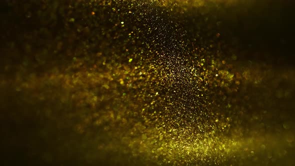 Golden Ink in Water Shooting with High Speed Camera. Gold Drops of Paint Dropped, Reacting, Creating alt