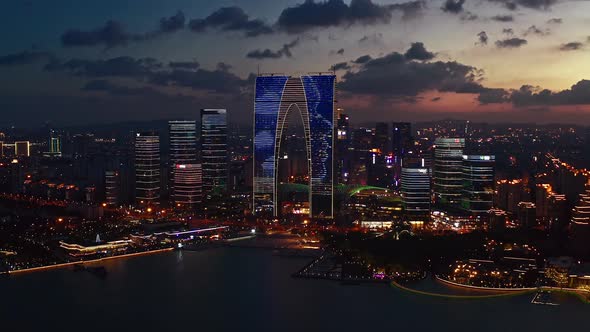 CBD buildings by Jinji Lake at night in Suzhou alt