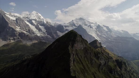 Pan of Mannlichen Mountain Near Jungfrau Switzerland  alt