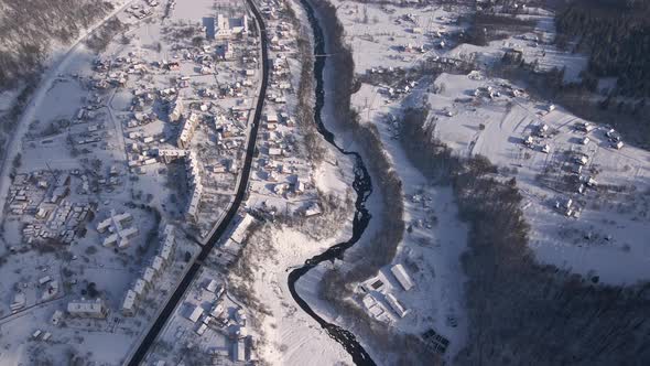 Top Down Aerial View of the Small Town in Sunny Winter Day Drone  Footage