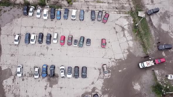 Fines for Parking Violations By Evacuators From a Bird's Eye View Guarded By Police