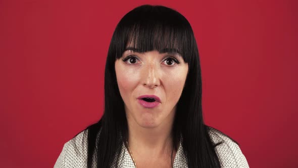 Young Caucasian Woman Surprised and Shocked Saying WOW alt