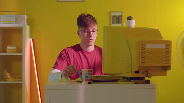 Man Freelancer Is Tired to Work at Computer