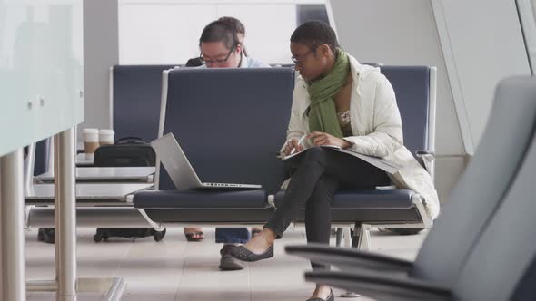 Businesswoman working at airport