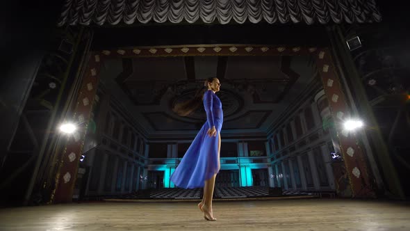 Group Young Skillful Ballerinas Dancing Modern Ballet on the Stage of Large Hall alt