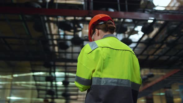 Supervisor Woman Analysing Work at Modern Manufacturing Production Warehouse alt