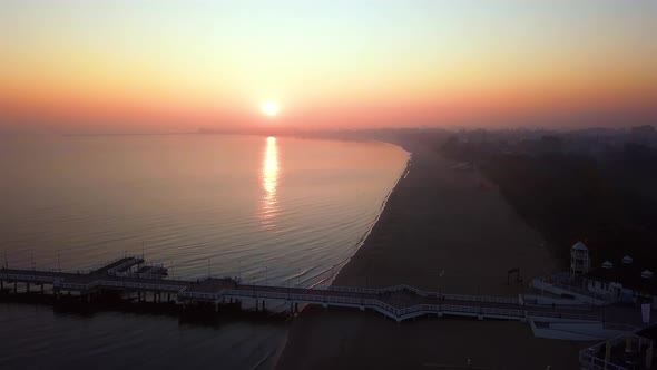 Hazy Sunrise Over Sea