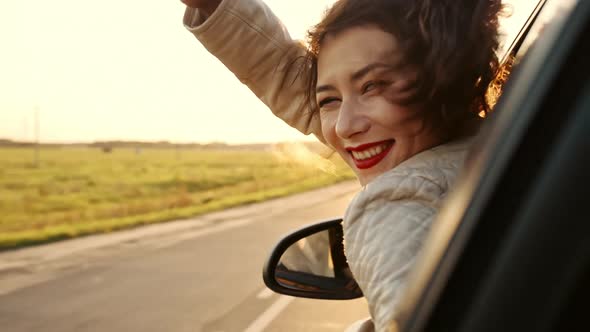 Stylish Brunette Smiling to the Camera alt