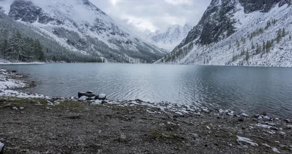 Snow Mountain Lake Timelapse at the Autumn Time alt